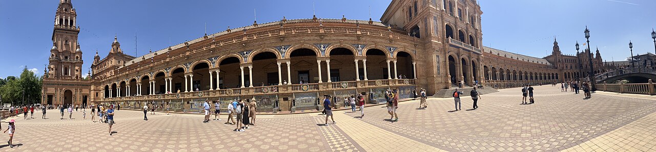 The sweeping curved colonnade and canal of Plaza de España in Seville