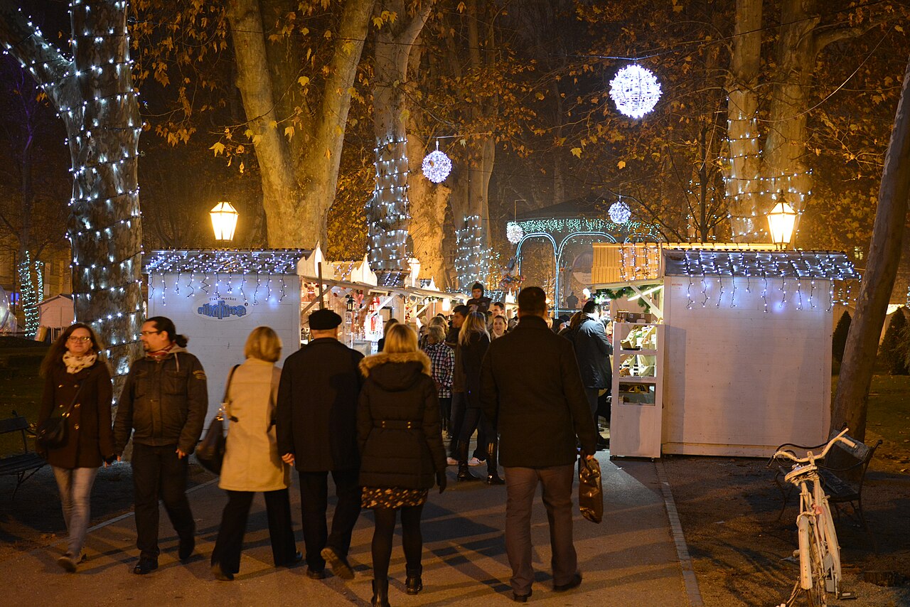 Zagreb Advent Christmas market stalls glowing in the evening