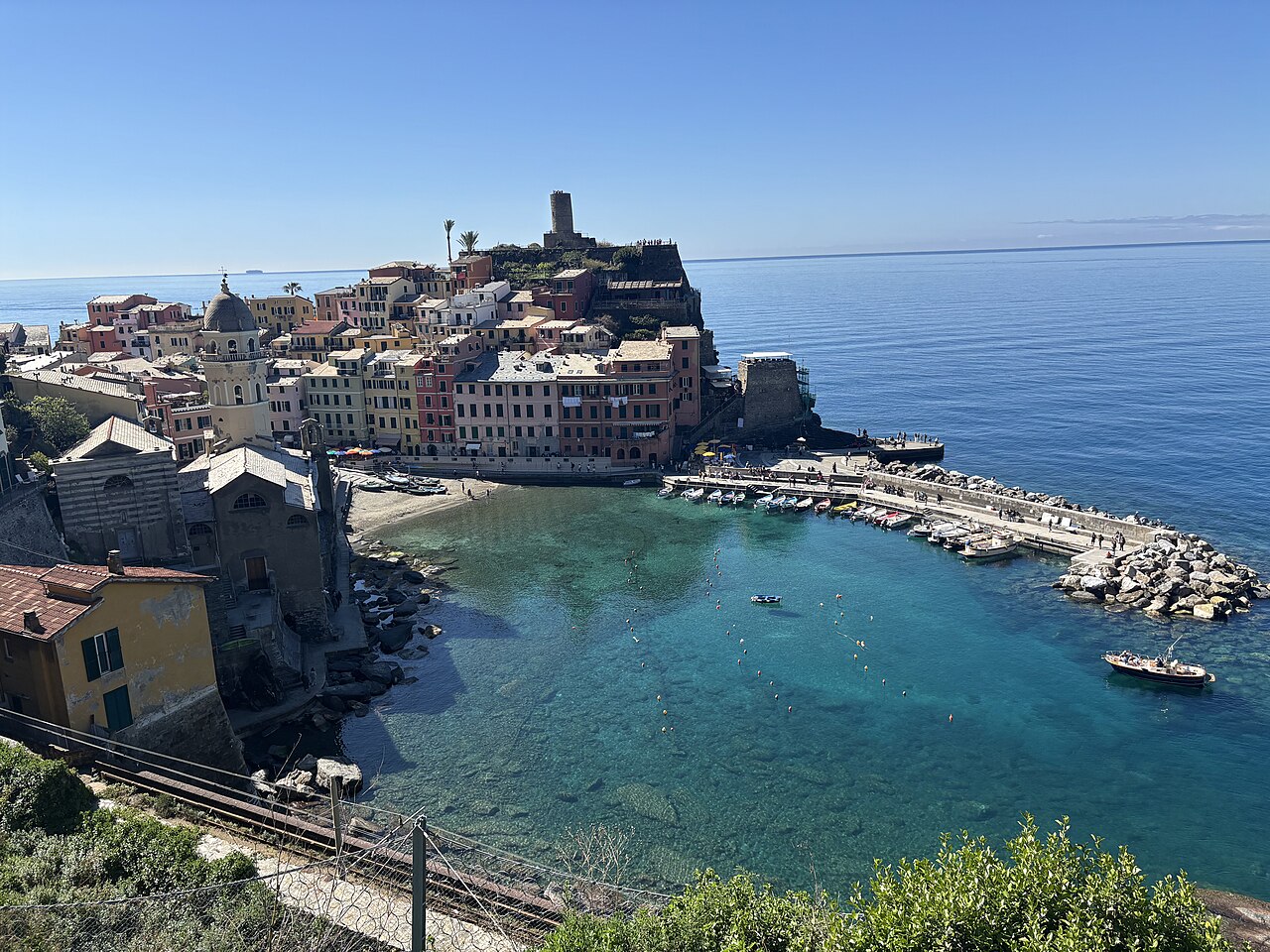 The harbour of Vernazza in the Cinque Terre with colourful houses around the bay