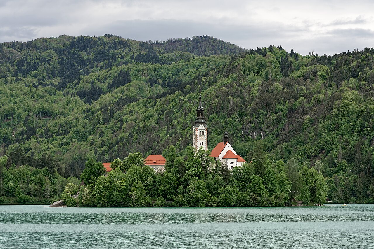 Bled Island with its church on Lake Bled, Slovenia, mountains behind